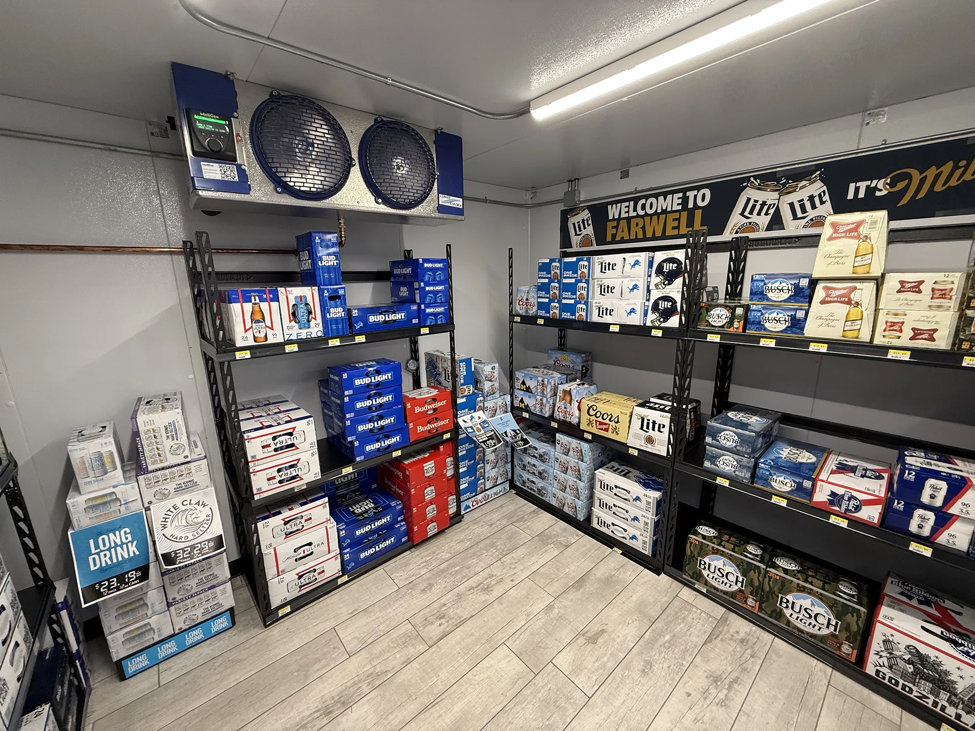 mart_project3 Walk-in beer cooler with stocked shelves and refrigerated storage racks