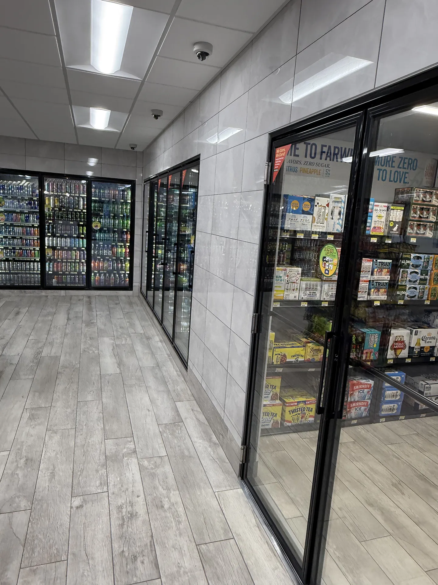 mart_project6 Walk-in beer cooler with glass doors and beverage displays