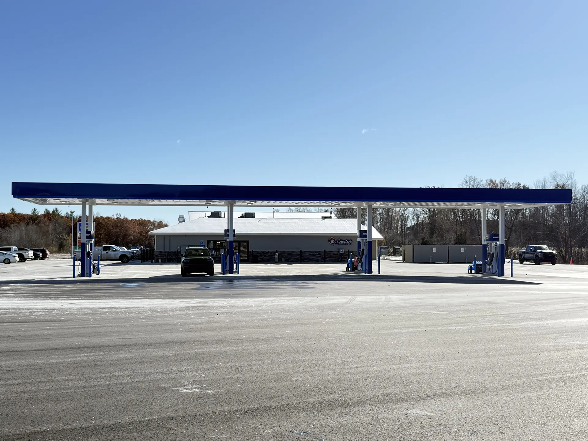 mart_project9 Sunoco gas station fuel pumps and convenience store front.